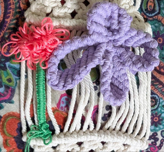 Detailed squared knot on silky thread flower and macrame cord butterfly